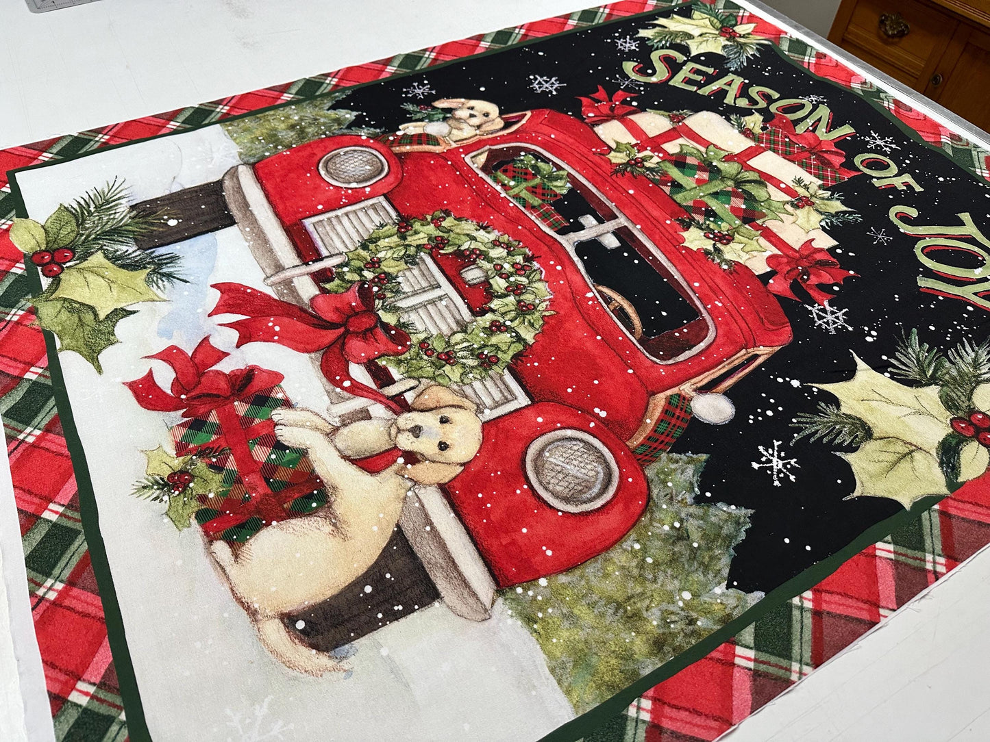 Festive Puppy Christmas Fabric Panel - 36x45 Quilting Material with Red Truck by Susan Winget